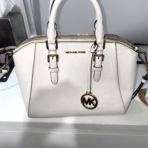 Brand new Micheal Kors mini purse.